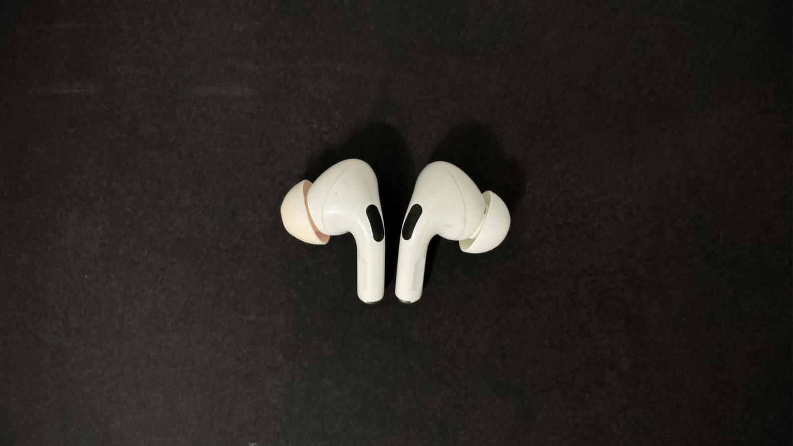 AirPods Pro (1st Gen) Earbuds Close-Up AirPods Pro (1st Gen) earbuds after 4 years of use